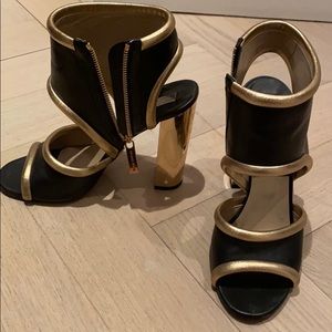 Michael Kors black and gold heels.